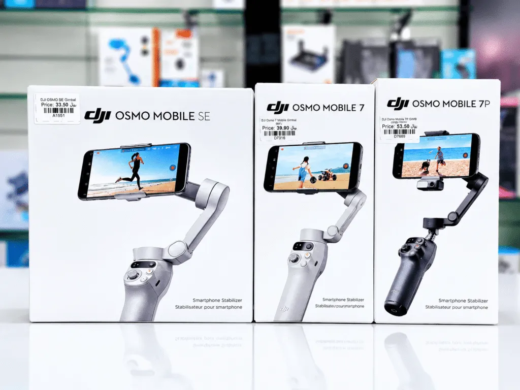 Boxed DJI Osmo Mobile smartphone gimbal stabilizers in Oman on display at Sky Gadgets, including Osmo Mobile SE, Osmo Mobile 7, and Osmo Mobile 7P